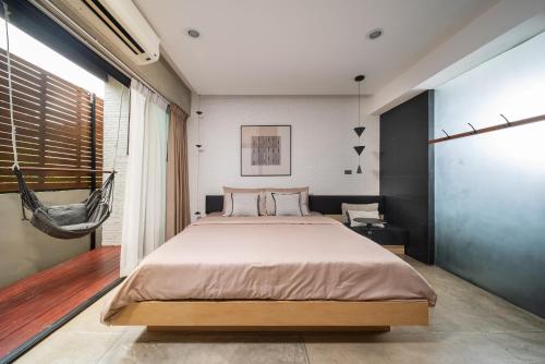 The Hotel Journal Chiangmaiにあるベッド