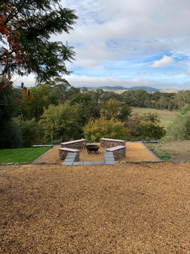 a picnic area with a picnic table in a park at Barossa Idyll in Tanunda
