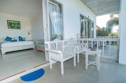 Postel nebo postele na pokoji v ubytování Grand Sea View Lembongan
