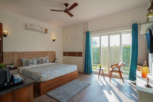 Postel nebo postele na pokoji v ubytování Hriday Bhoomi - Luxury Cottages & Villa in Jim Corbett