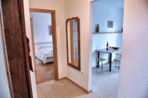 Ένα ή περισσότερα κρεβάτια σε δωμάτιο στο Apartman Gema