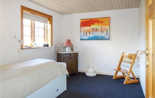 Stunning Home In Svaneke With Kitchenにあるベッド