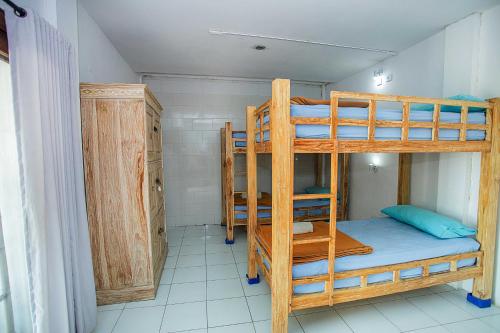 Postel nebo postele na pokoji v ubytování Grand Sea View Lembongan