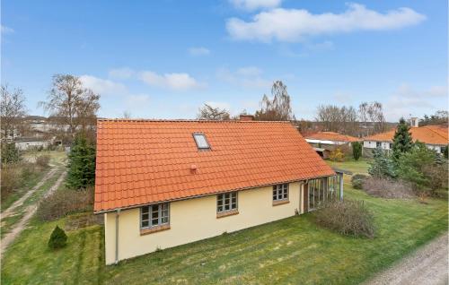 an overhead view of a house with an orange roof at 3 Bedroom Gorgeous Home In Højslev in Højslev