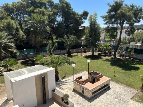 an aerial view of a backyard with a grill at Villa Soleanna Residence in Vieste