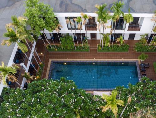 an overhead view of a building with a swimming pool at The Bliss Angkor in Siem Reap