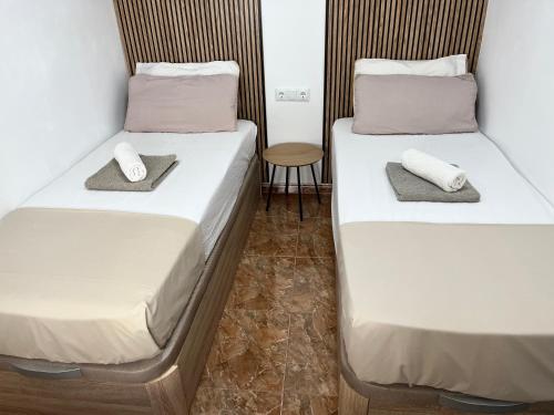 Postel nebo postele na pokoji v ubytování Santomera 1st Line