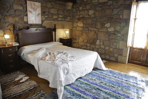 Postel nebo postele na pokoji v ubytování Casa Velarde