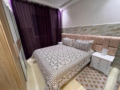 Postel nebo postele na pokoji v ubytování Appartement au rez de chaussée avec Wifi et propreté garantie