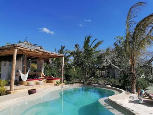 La alberca dentro o cerca de Amani - Private Ocean House with Pool