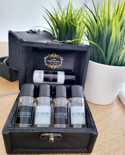a black box filled with bullets sitting on a table at CASA OURO D'ALVA - Luxury Lodging, SPA & WELLNESS in Penalva do Castelo