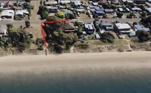 an aerial view of a house next to the beach at Beach Holiday Home-Close to Airport-3 Bed & 2 Bath in Lauderdale
