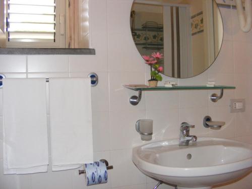 a bathroom with a sink and a mirror at Casa Mafalda B&B in Lipari