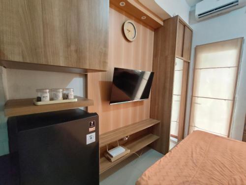 Postel nebo postele na pokoji v ubytování Sleep Room transpark Cibubur