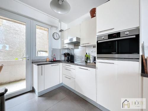 Køkken eller tekøkken på Digue de Mer - Appt Vue Mer 3CH Balcon, Bray-Dunes