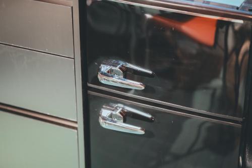 a close up of a drawer with two handles at Chungking Mansions Busan in Busan