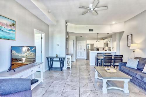 a living room with a couch and a table at Madeira Bay Resort I 1504 in St Pete Beach