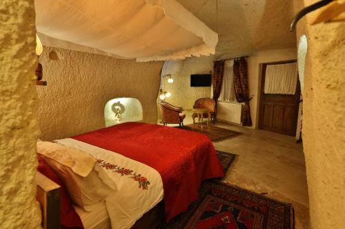 Demisos Caves Hotelにあるベッド