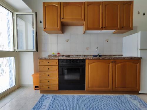 Kuchyň nebo kuchyňský kout v ubytování Piscitello's