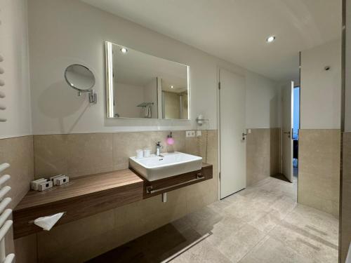Koupelna v ubytování Fontane Hotel