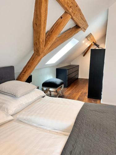 Voodi või voodid majutusasutuse Weingut & Gästezimmer Weißenbacher toas