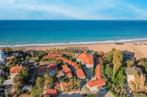 an aerial view of a resort near the beach at Adora Calma Beach Hotel Adults Only in Kızılot