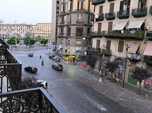 a view of a city street with cars and buildings at AuRoom in Naples