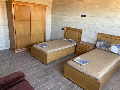 Una cama o camas en una habitación de El Ático