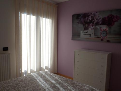 Postel nebo postele na pokoji v ubytování Andalo, Residence al Girasole FamPedron