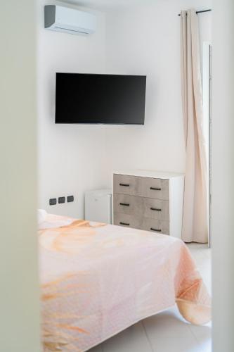 Ένα ή περισσότερα κρεβάτια σε δωμάτιο στο Bella Stabia Rooms