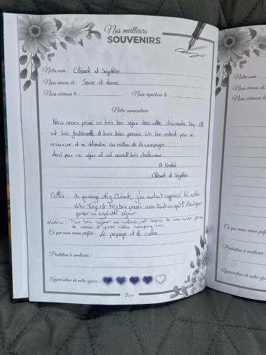 a piece of paper with writing on it at Tiny House in Digny