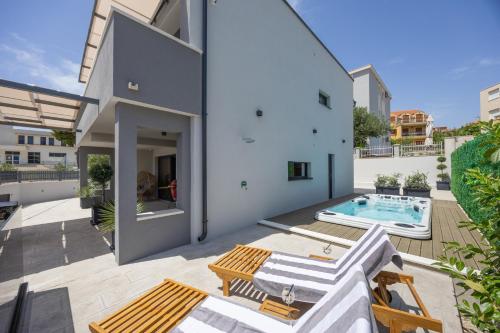 an image of a house with a swimming pool at Villa Roma Sauna and Hydrotherapy Pool in Trogir
