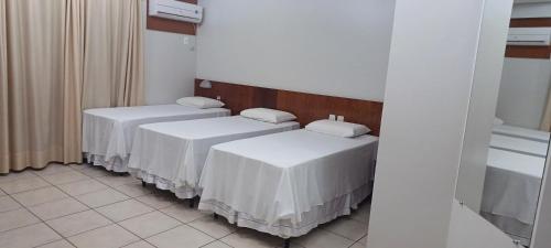 Katil atau katil-katil dalam bilik di Hotel Thermas Bonsucesso
