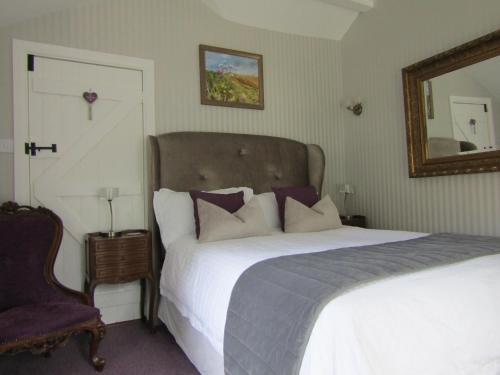 Katil atau katil-katil dalam bilik di Frogs Hall B&B