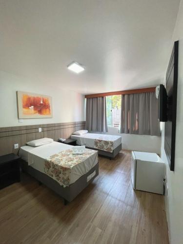 Postel nebo postele na pokoji v ubytování Hotel Nacional Inn São Paulo- Próximo ao SAMPA SKY