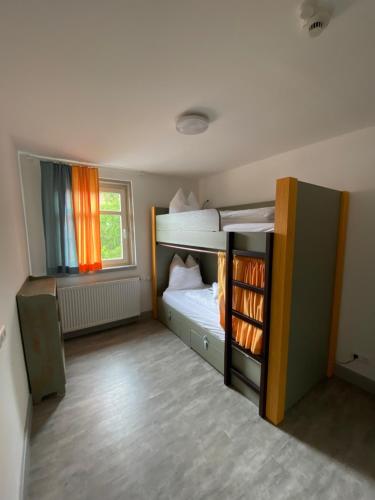 Ένα ή περισσότερα κρεβάτια σε δωμάτιο στο Hostel Balingen