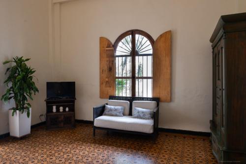 Телевизор и/или развлекательный центр в Casa Bustamante Hotel Boutique