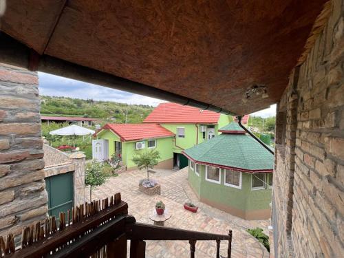 a view of a courtyard from a building at R&H apartmani in Slankamenački Vinogradi