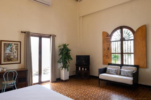 Кровать или кровати в номере Casa Bustamante Hotel Boutique