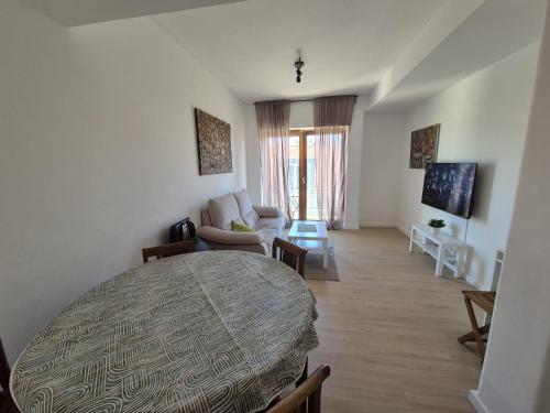 Μια τηλεόραση ή/και κέντρο ψυχαγωγίας στο Figueira Family Apartment