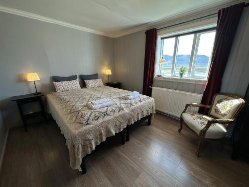 Postel nebo postele na pokoji v ubytování Helluland Guesthouse
