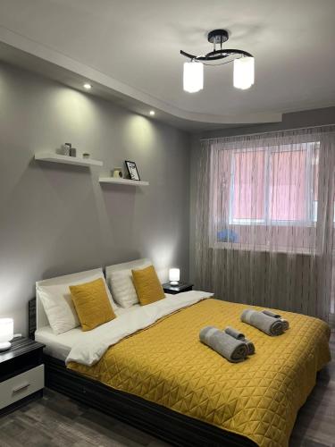 Postel nebo postele na pokoji v ubytování John Apartment 2