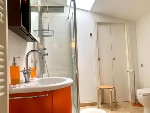 a bathroom with a sink and a shower at B&B La Casa Di Tufo in Orvieto