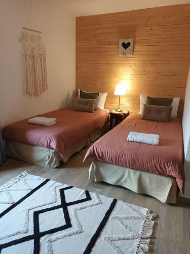 Postel nebo postele na pokoji v ubytování Les Gabelous - micro-gîtes - Viroinval