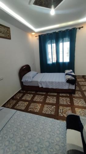 Postel nebo postele na pokoji v ubytování Casa Hamidane 2