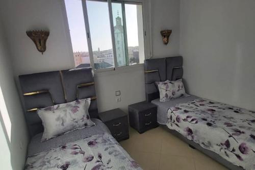 Postel nebo postele na pokoji v ubytování Belle maison bon prix