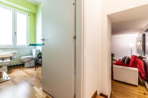 a bathroom with a toilet and a sink at I_Like_Sassari Apartment2.0 in Sassari