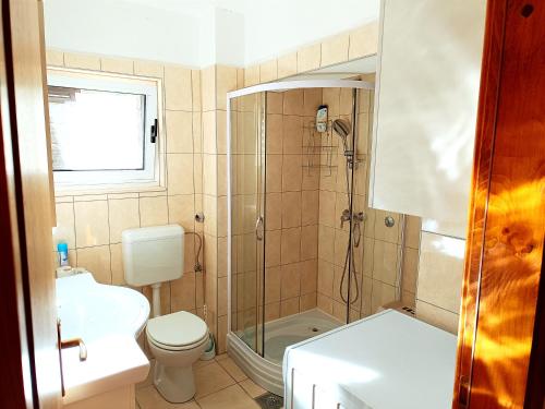 Koupelna v ubytování Apartment Bile - close to the beach, shops, airport