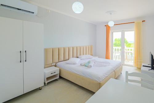 Katil atau katil-katil dalam bilik di Vila Marina apartments