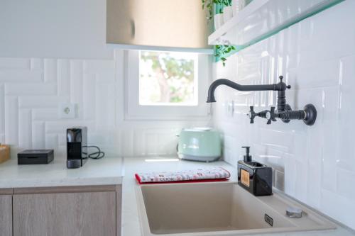 Dapur atau dapur kecil di Nalu Luxury Suites Adults Only